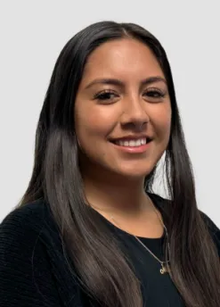 woman with long dark hair and brown complexion