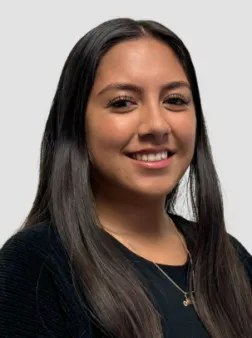 woman with long dark hair and brown complexion