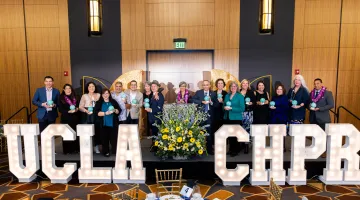 Honorees holding their awards at the UCLA Center for Health Policy Research's 30th anniversary gala. Dr. Efrain Talamantes, Sherry M. Hirota, Sunghee Lee, Shana Charles, Alex Ortega, Jeffrey Reynoso, Sue Holtby, Robert Otto Valdez, Ninez A. Ponce, Dr. Tomás Aragón, Maria-Elena De Trinidad Young, Dr. Linette T. Scott, Susan Demarois, Usha Lee Mcfarling, Louise McCarthy, Delight Satter, and Alex Sripipatana.